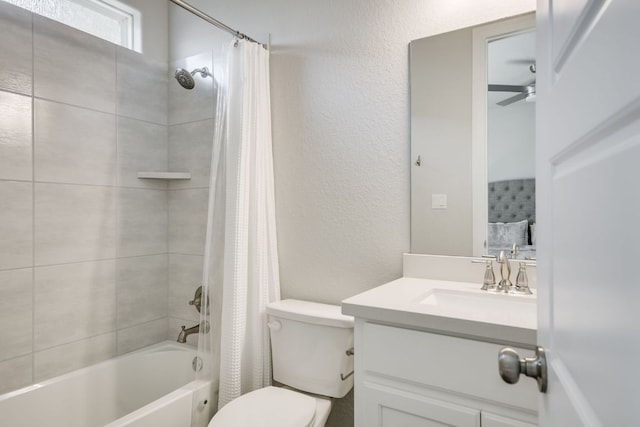 206 Bridge Water Loop, Dripping Springs, TX 78620 - full bathroom featuring shower / bath combo with shower curtain, vanity, toilet, ceiling fan, and a textured wall