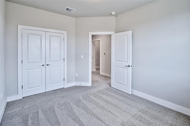 5907 Rotunda Vw, Austin, TX 78747 - unfurnished bedroom with carpet, baseboards, and a closet