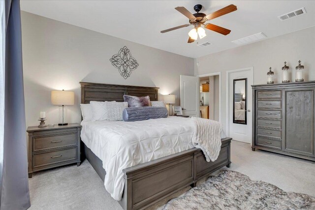 167 Limestone Trl Unit 76, Austin, TX 78737 - bedroom with light colored carpet and a ceiling fan
