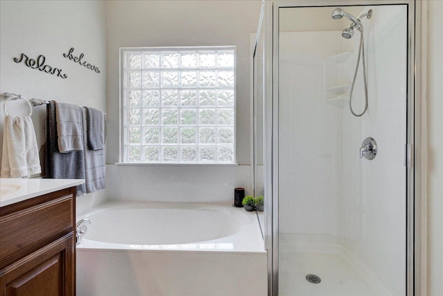 167 Limestone Trl Unit 76, Austin, TX 78737 - bathroom with a stall shower, a bath, and vanity