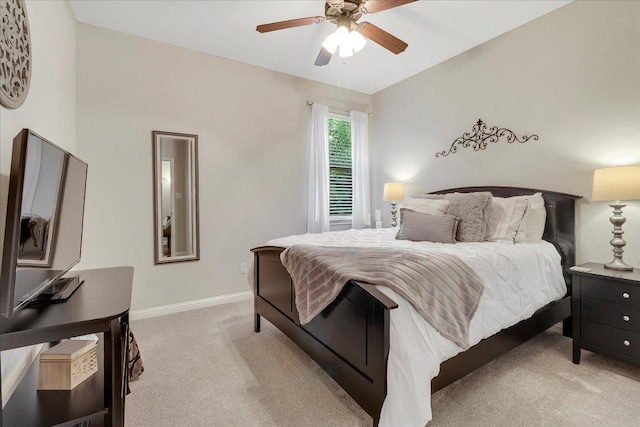 167 Limestone Trl Unit 76, Austin, TX 78737 - bedroom with light carpet, baseboards, and a ceiling fan