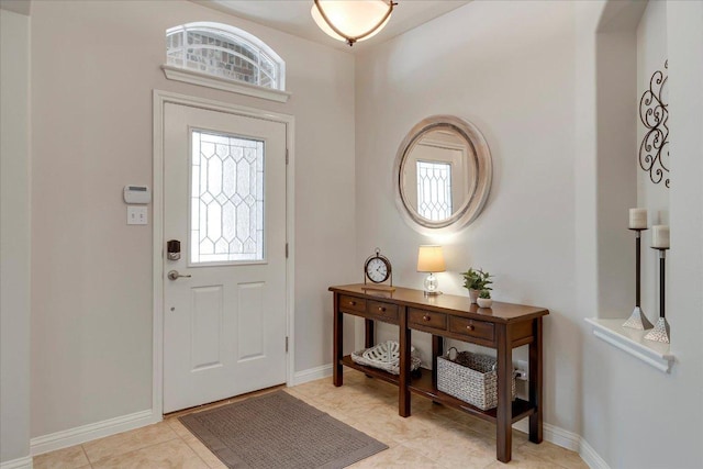 167 Limestone Trl Unit 76, Austin, TX 78737 - entryway featuring healthy amount of natural light, baseboards, and light tile patterned floors