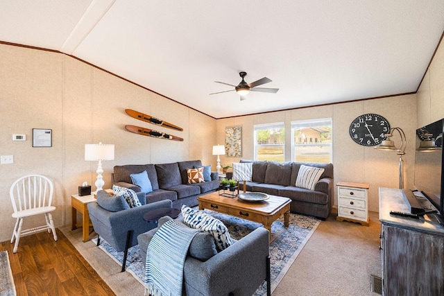 231 Wolf Run, Burnet, TX 78611 - living area featuring a ceiling fan, lofted ceiling, wood finished floors, and ornamental molding