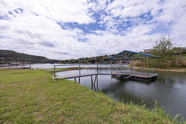 231 Wolf Run, Burnet, TX 78611 - dock with a water view and a lawn