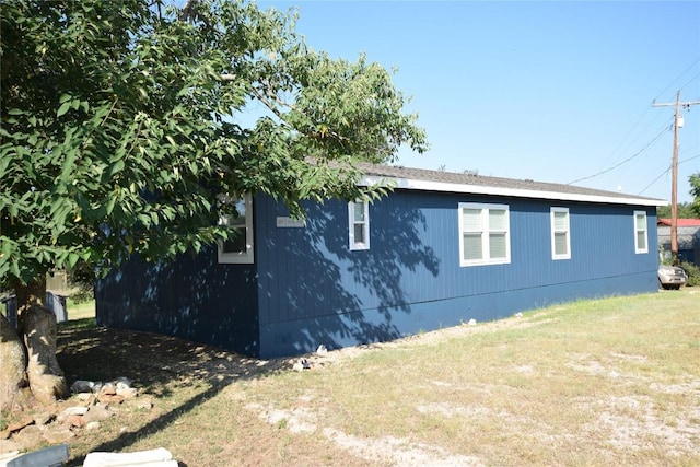 231 Wolf Run, Burnet, TX 78611 - view of property exterior featuring a lawn