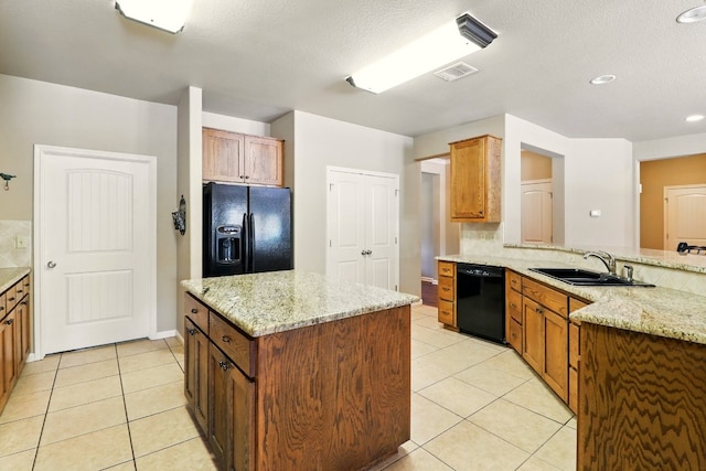 529 Honeycomb Cir, Driftwood, TX 78619 - kitchen with black appliances, a sink, light tile patterned floors, a center island, and recessed lighting