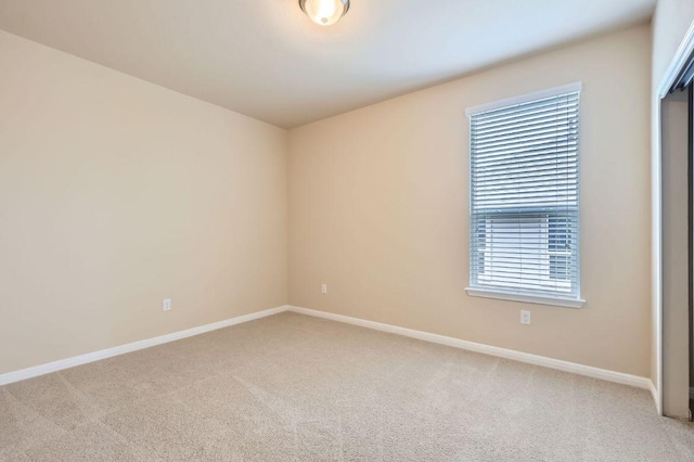 406 Epiphany Ln, Pflugerville, TX 78660 - empty room with light carpet and baseboards