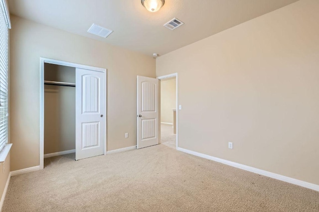 406 Epiphany Ln, Pflugerville, TX 78660 - unfurnished bedroom with light colored carpet and a closet