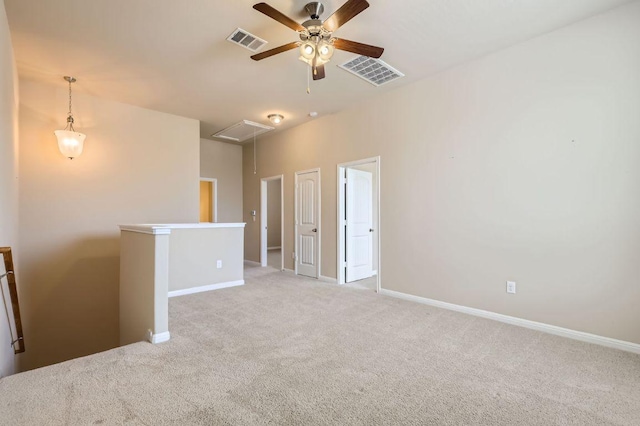 406 Epiphany Ln, Pflugerville, TX 78660 - empty room featuring attic access, light colored carpet, and ceiling fan