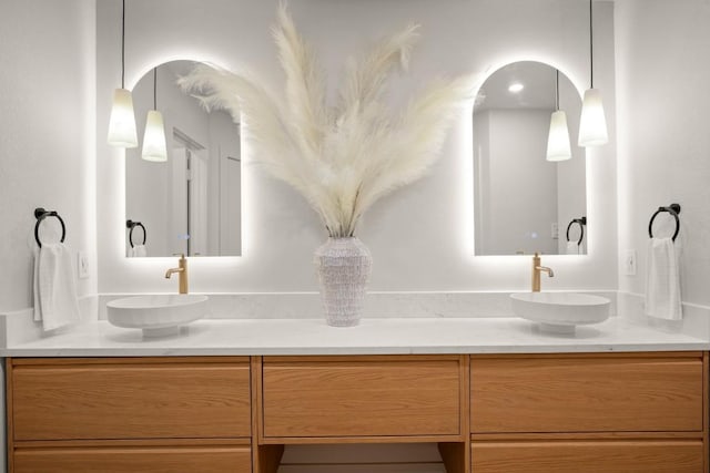 12303 Turtleback Ln, Austin, TX 78727 - bathroom view of double vanity and arched walkways