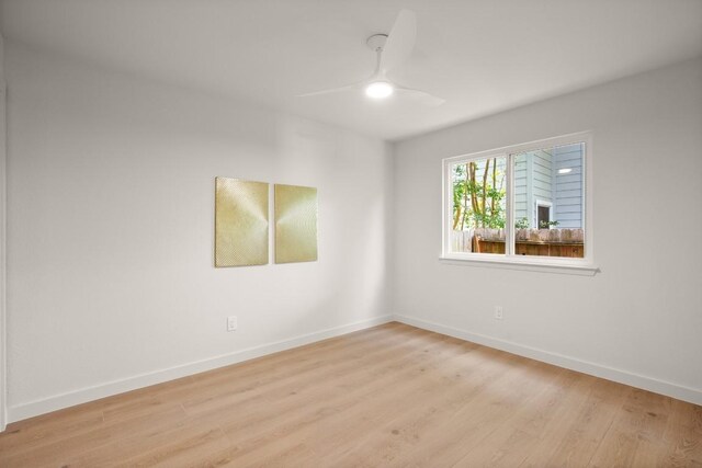 12303 Turtleback Ln, Austin, TX 78727 - spare room with ceiling fan and wood finished floors