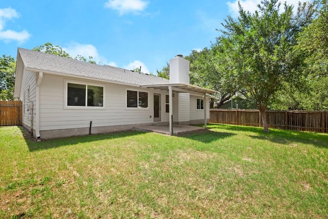 12303 Turtleback Ln, Austin, TX 78727 - rear view of house with a chimney, a patio area, and a fenced backyard
