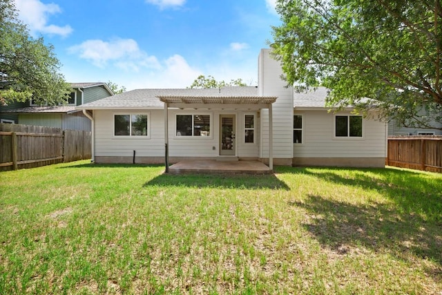 12303 Turtleback Ln, Austin, TX 78727 - back of house with a fenced backyard, a patio area, a pergola, and a chimney