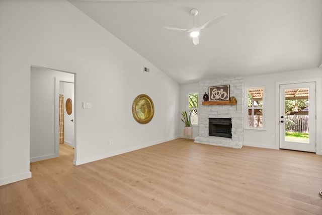 12303 Turtleback Ln, Austin, TX 78727 - unfurnished living room with high vaulted ceiling, ceiling fan, a fireplace, and light wood-type flooring