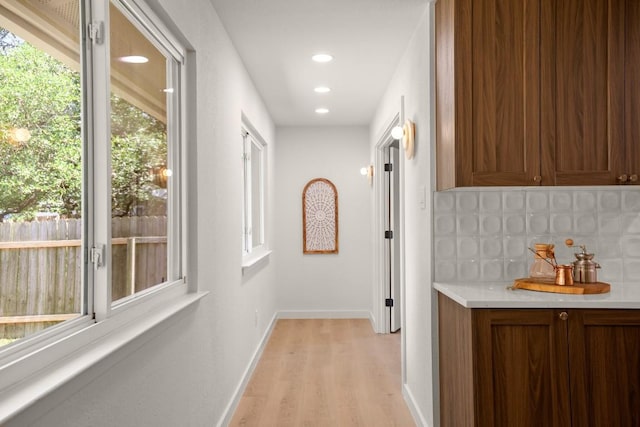12303 Turtleback Ln, Austin, TX 78727 - corridor featuring light wood-style flooring and recessed lighting