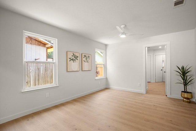 12303 Turtleback Ln, Austin, TX 78727 - empty room with ceiling fan and light wood-style floors