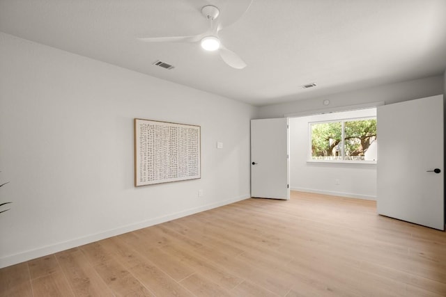 12303 Turtleback Ln, Austin, TX 78727 - empty room featuring light wood-style flooring and a ceiling fan