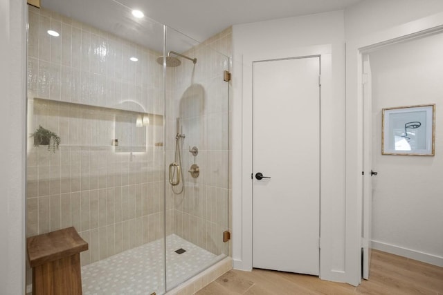 12303 Turtleback Ln, Austin, TX 78727 - full bath featuring a shower stall and wood finished floors