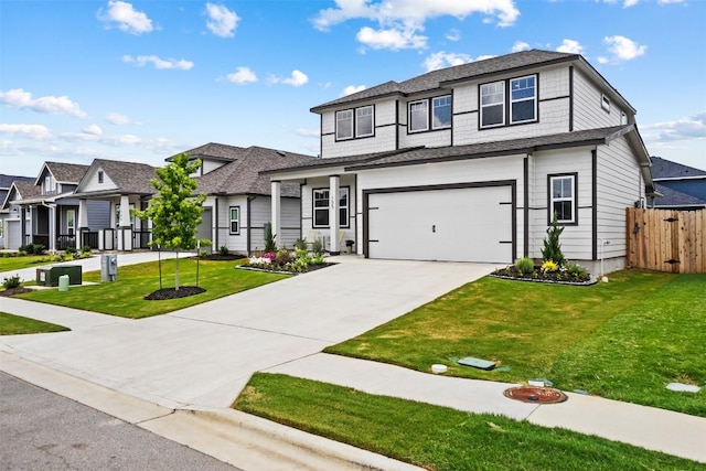 155 Denali Dr, Kyle, TX 78640 - view of front facade featuring driveway, an attached garage, and a residential view