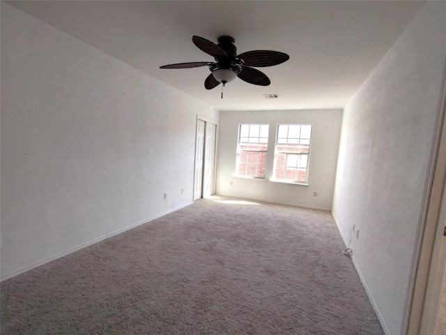 2108 Cottontail Dr, Leander, TX 78641 - spare room featuring carpet flooring, a ceiling fan, and baseboards