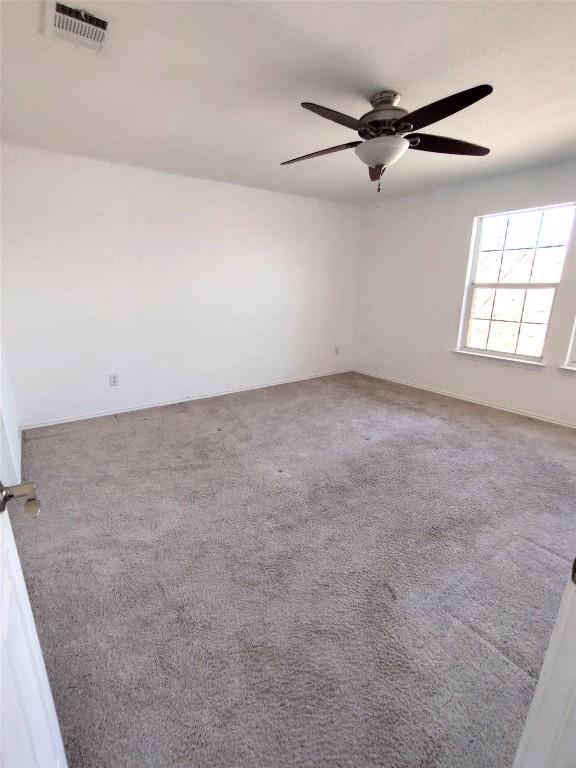 2108 Cottontail Dr, Leander, TX 78641 - carpeted spare room featuring ceiling fan