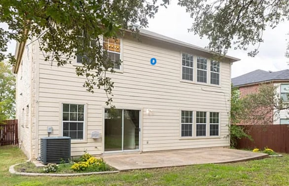 2108 Cottontail Dr, Leander, TX 78641 - rear view of house featuring cooling unit and a patio area
