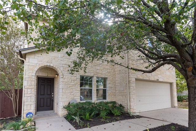 2108 Cottontail Dr, Leander, TX 78641 - view of front facade with stone siding and driveway