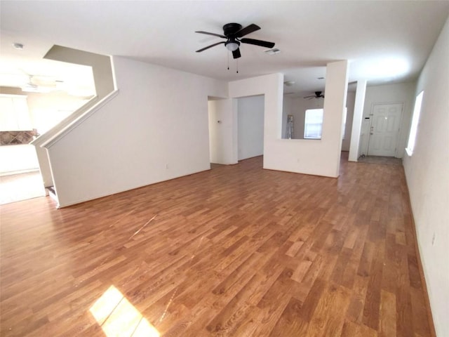 2108 Cottontail Dr, Leander, TX 78641 - unfurnished living room featuring ceiling fan and light wood finished floors