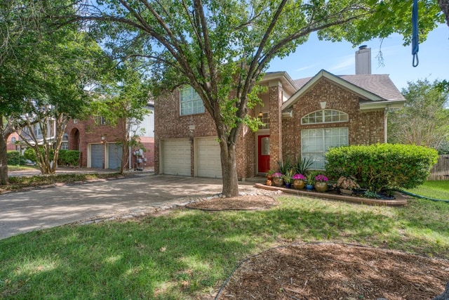 6429 Clay Allison Pass, Austin, TX 78749 - traditional-style home featuring brick siding, concrete driveway, an attached garage, a chimney, and a front lawn