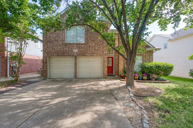 6429 Clay Allison Pass, Austin, TX 78749 - view of front facade featuring brick siding, a garage, and concrete driveway