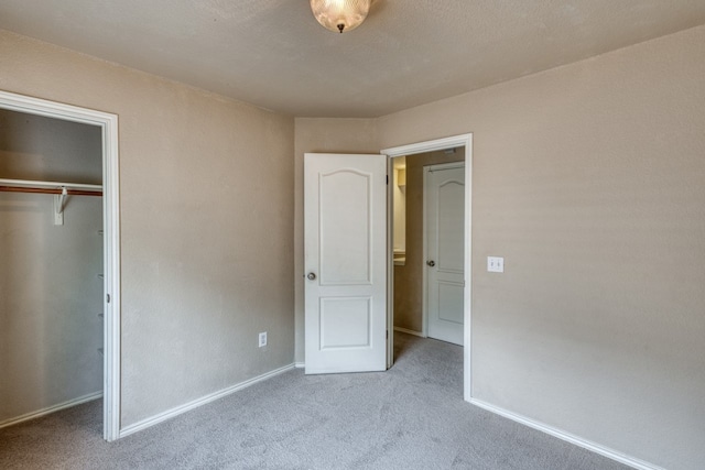 6429 Clay Allison Pass, Austin, TX 78749 - unfurnished bedroom with carpet flooring, a closet, and baseboards
