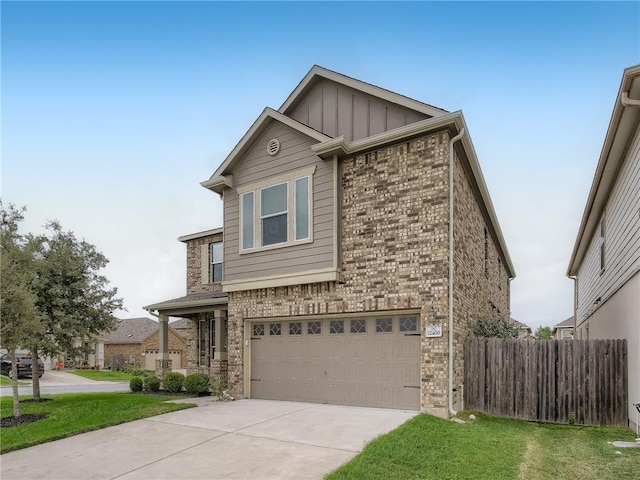 12400 Britannic Dr, Austin, TX 78753 - view of front facade with a garage, board and batten siding, and brick siding