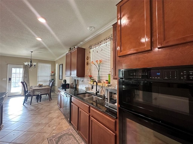 12400 Britannic Dr, Austin, TX 78753 - kitchen with crown molding, dishwashing machine, a chandelier, a sink, and brown cabinets