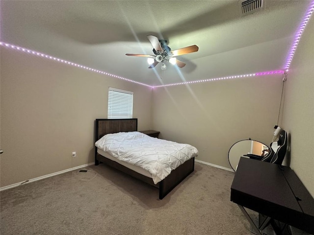 12400 Britannic Dr, Austin, TX 78753 - bedroom featuring carpet flooring, baseboards, and a ceiling fan