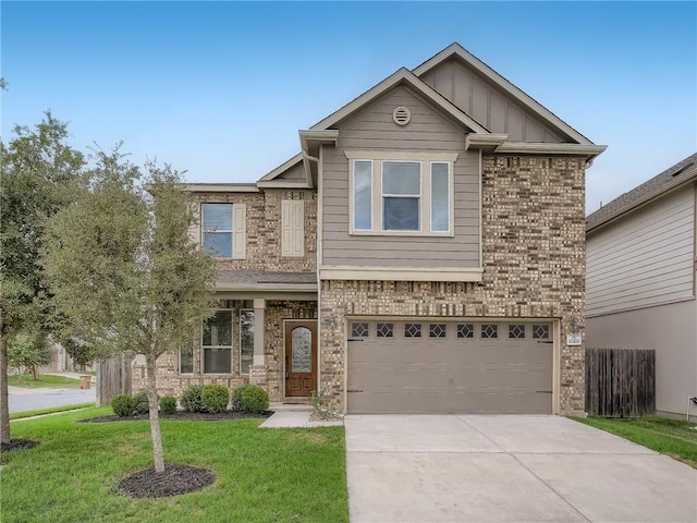 12400 Britannic Dr, Austin, TX 78753 - view of front of house featuring concrete driveway, a garage, brick siding, and board and batten siding