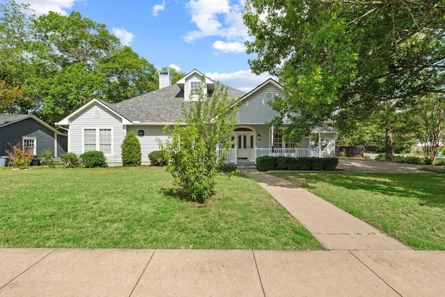 6008 Woodview Ave, Austin, TX 78757 - view of front of property with a porch, a front lawn, a chimney, and a shingled roof