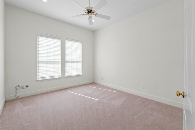 6008 Woodview Ave, Austin, TX 78757 - carpeted empty room featuring baseboards and ceiling fan