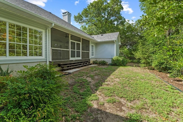 6008 Woodview Ave, Austin, TX 78757 - view of yard with a ceiling fan and a sunroom