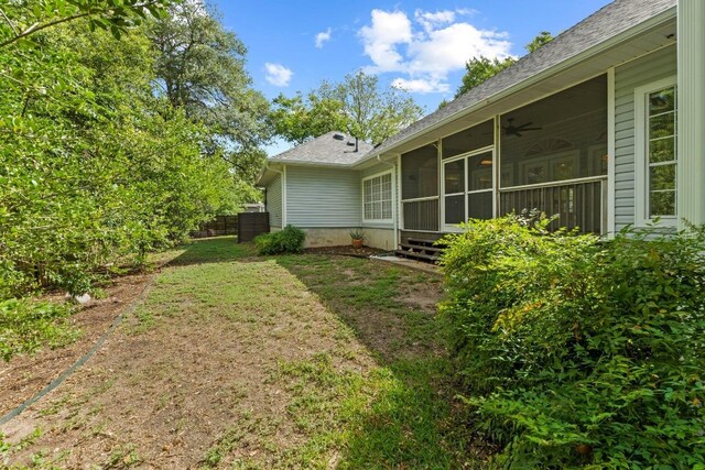 6008 Woodview Ave, Austin, TX 78757 - view of yard featuring a sunroom and a ceiling fan