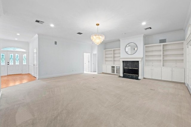 6008 Woodview Ave, Austin, TX 78757 - unfurnished living room featuring crown molding, light carpet, a chandelier, recessed lighting, and a premium fireplace