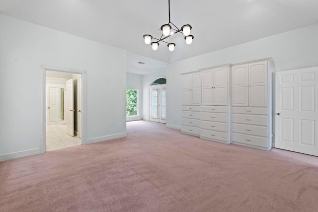 6008 Woodview Ave, Austin, TX 78757 - unfurnished bedroom with light colored carpet, a chandelier, and baseboards
