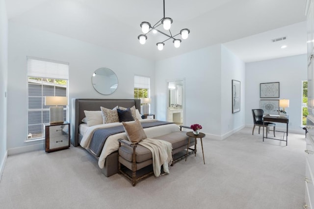 6008 Woodview Ave, Austin, TX 78757 - bedroom with light colored carpet, a chandelier, and a desk
