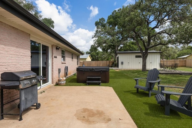 219 S Bluff St, Dripping Springs, TX 78620 - view of yard with a hot tub, a patio, and an outbuilding