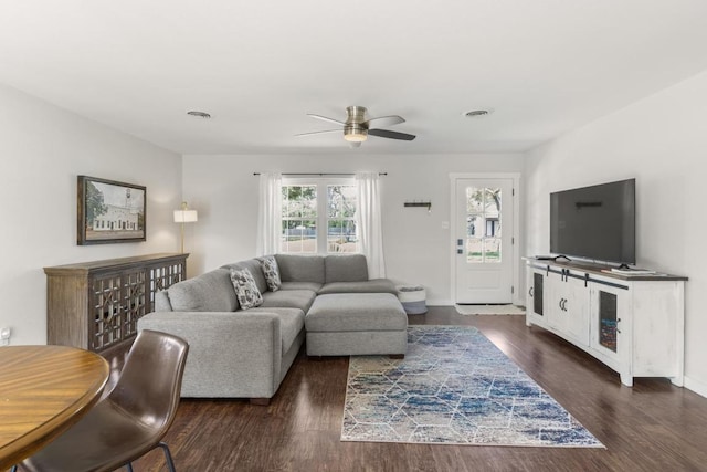 219 S Bluff St, Dripping Springs, TX 78620 - living room with a ceiling fan, wood finished floors, and baseboards