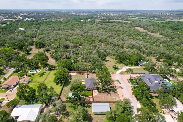 219 S Bluff St, Dripping Springs, TX 78620 - view of property location with a forest and nearby suburban area