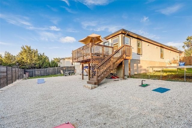 3204 Mount Vernon Ave, Lago Vista, TX 78645 - back of property featuring a wooden deck and stairway
