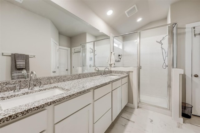 3204 Mount Vernon Ave, Lago Vista, TX 78645 - full bath with a shower stall, double vanity, marble finish floors, and recessed lighting
