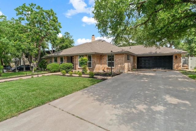 801 Lime Rock Dr, Round Rock, TX 78681 - single story home with driveway, a garage, a front yard, brick siding, and a chimney