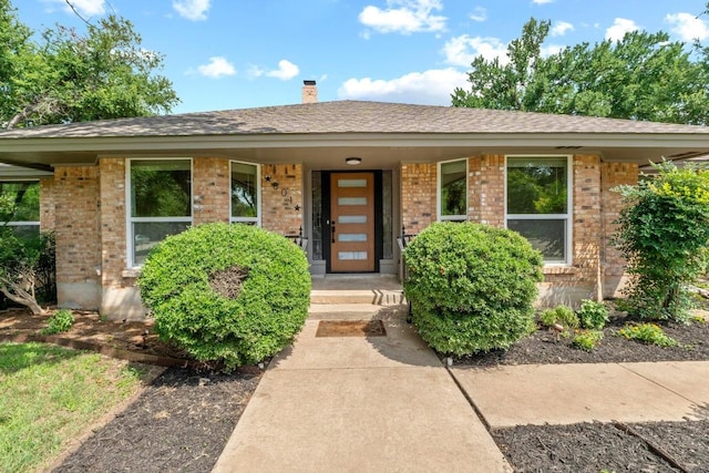 801 Lime Rock Dr, Round Rock, TX 78681 - ranch-style house with brick siding and a chimney