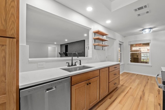 801 Lime Rock Dr, Round Rock, TX 78681 - kitchen featuring stainless steel dishwasher, light countertops, open shelves, light wood finished floors, and recessed lighting